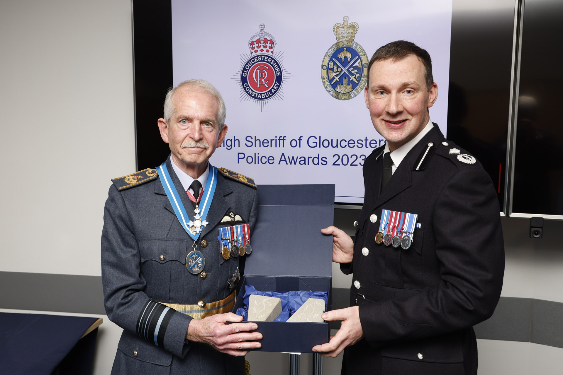 7 March 2023 – Having presented High Sheriff’s Awards to 20 highly deserving police officers, staff and volunteers, DCC Shaun West surprised me with a gift of a pair of bookends hand-carved from local stone.